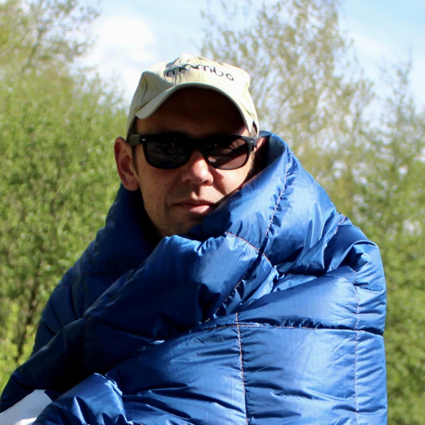 The Ultimate Snuggle Sack: Your Featherweight Friend for Outdoor Shenanigans - Perfect for Campfire Cuddles, Stadium Snoozes, and Festival Frolocking!